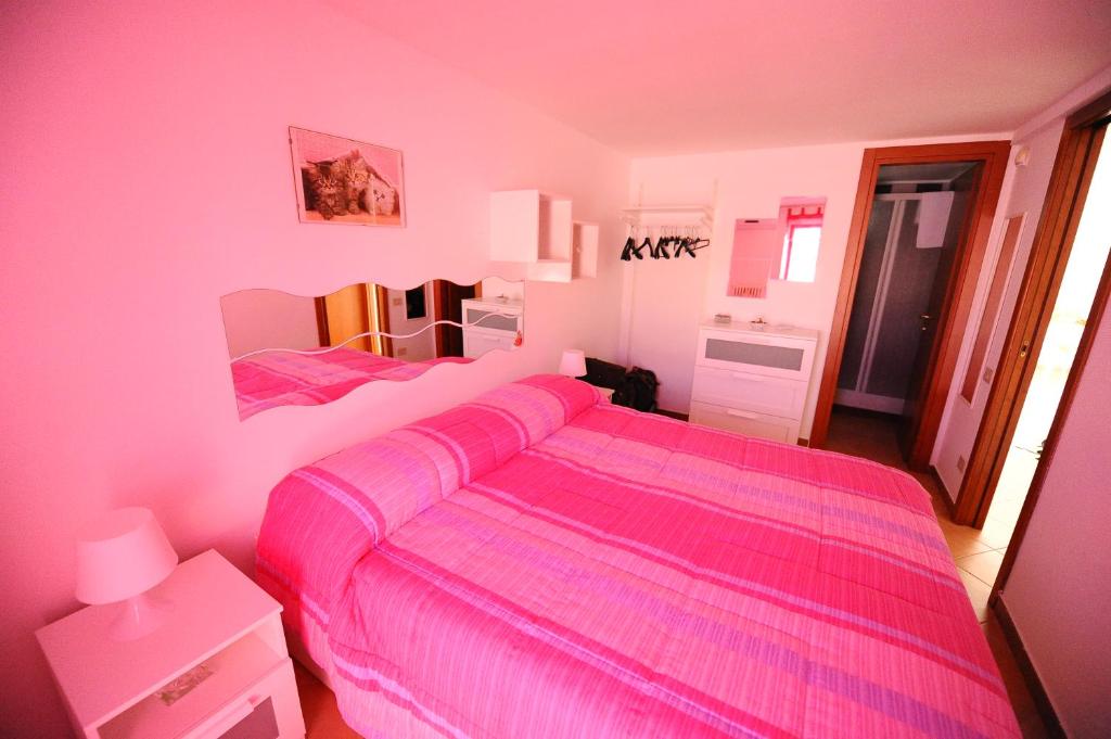 Postel nebo postele na pokoji v ubytování B&B Pizzo Cannicchio