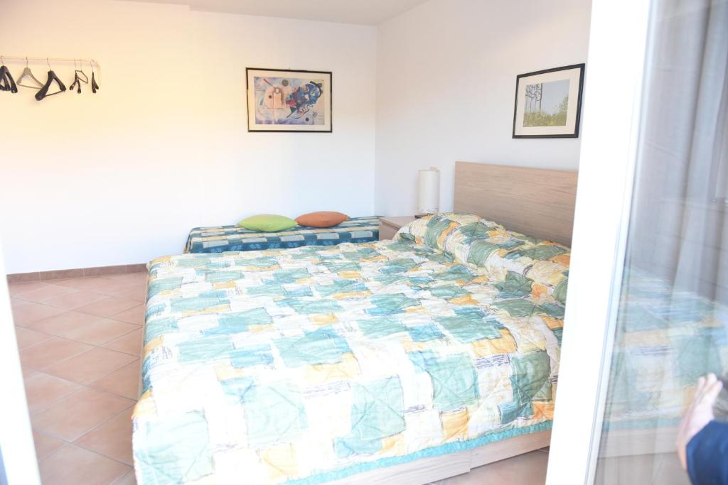 Postel nebo postele na pokoji v ubytování B&B Pizzo Cannicchio