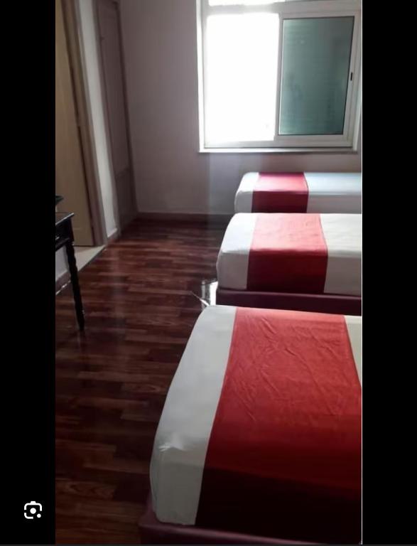 Ένα ή περισσότερα κρεβάτια σε δωμάτιο στο Hotel Astoria Tanger
