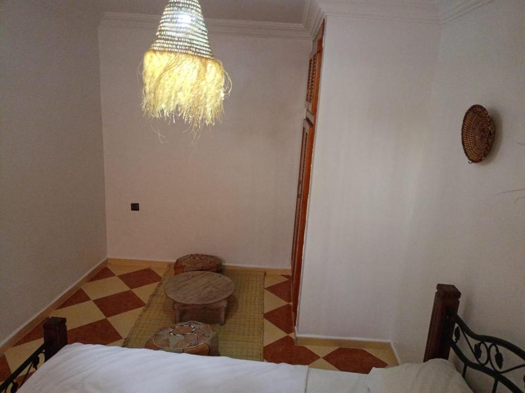 Postel nebo postele na pokoji v ubytování Aftass Hostel