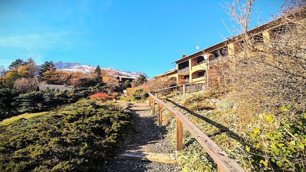 a house on the side of a hill at Résidence Les Anémones - Grand appartement T3, ensoleillé, avec balcon, pour 6 personnes MAE-6911 in Vallouise