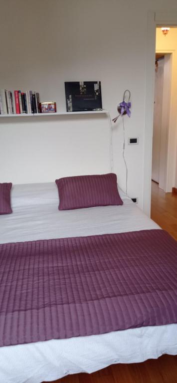 A bed or beds in a room at Il Pettirosso
