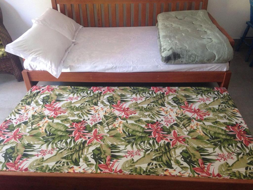 Postel nebo postele na pokoji v ubytování D'ajuda Flat