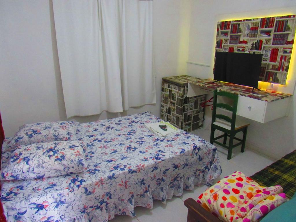 Postel nebo postele na pokoji v ubytování Hotel Pousada Girassol