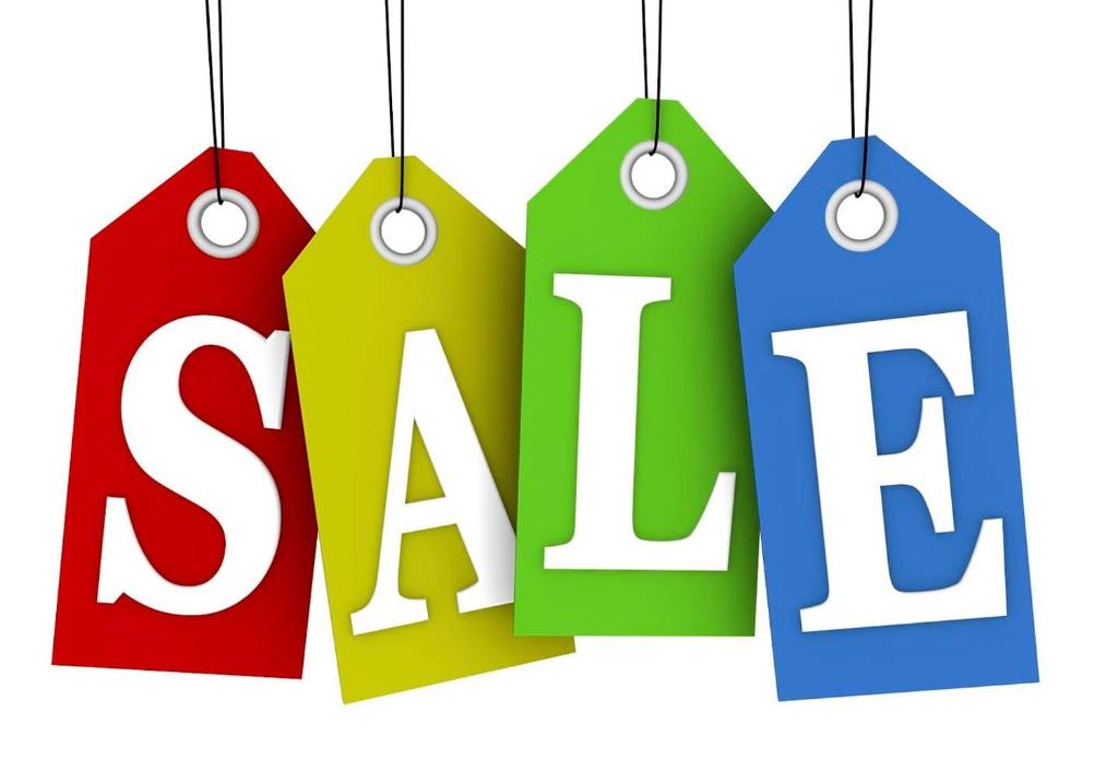 a group of tags with the word sale hanging from strings at Georgian Palace Hotel in Kutaisi