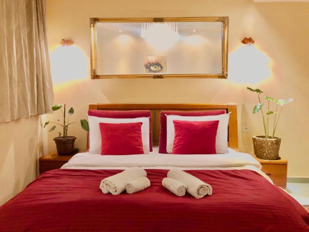 Postel nebo postele na pokoji v ubytování Urban Boutique Hotel