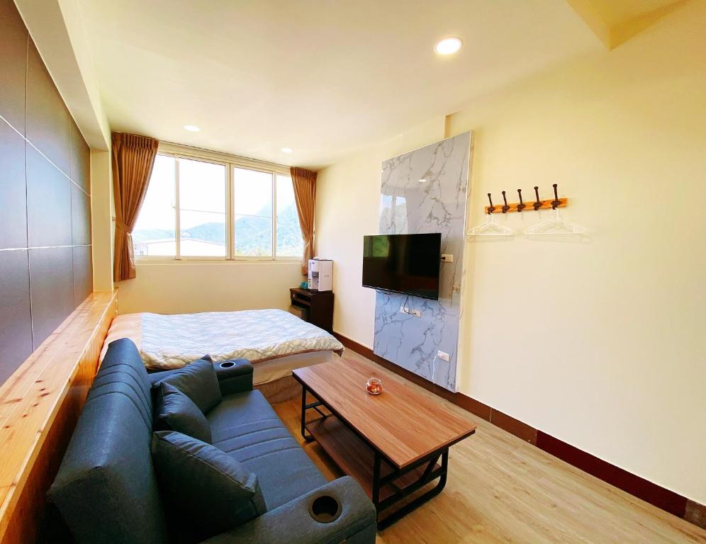 TV a/nebo společenská místnost v ubytování Saint Malo Homestay
