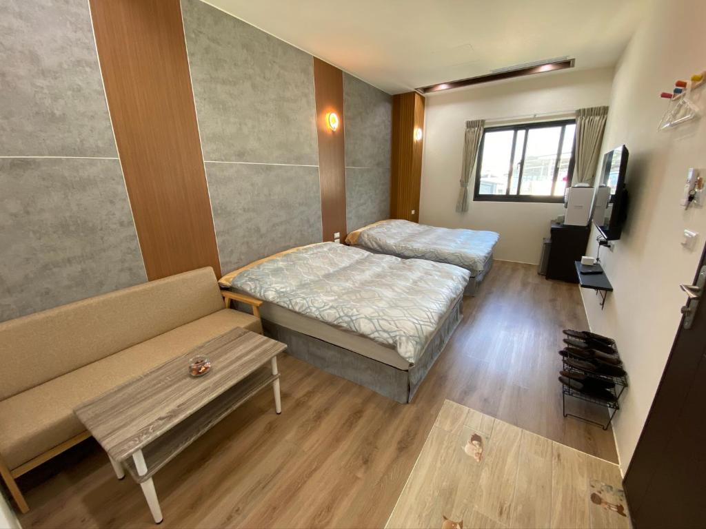 Postel nebo postele na pokoji v ubytování Saint Malo Homestay