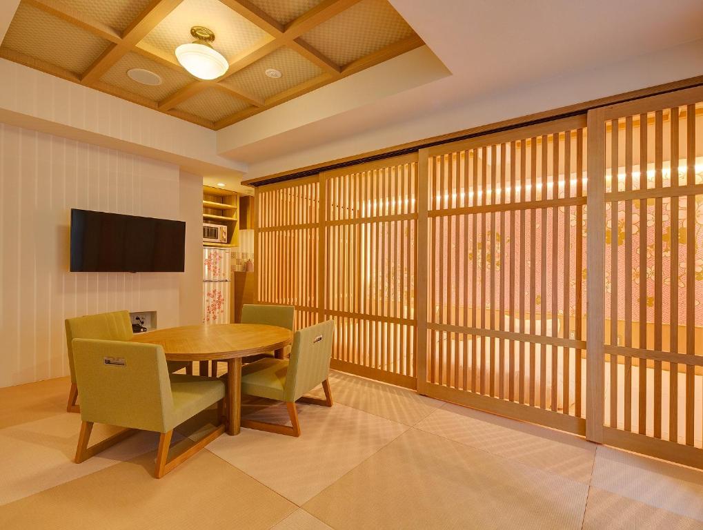 TV a/nebo společenská místnost v ubytování Hotel Sanrriott Kitahama