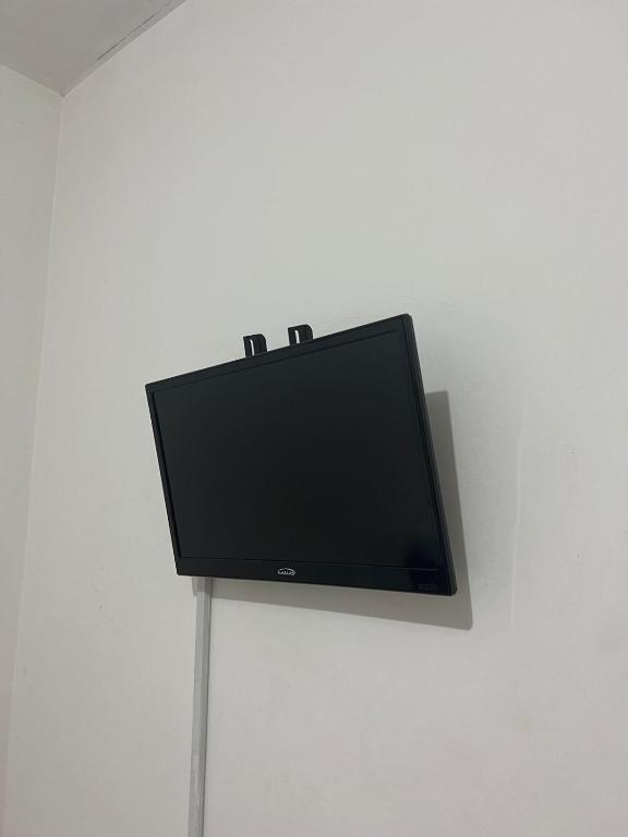 TV a/nebo společenská místnost v ubytování Hotel Palacio Real