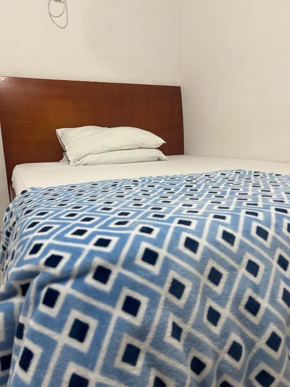 Postel nebo postele na pokoji v ubytování Hotel Palacio Real