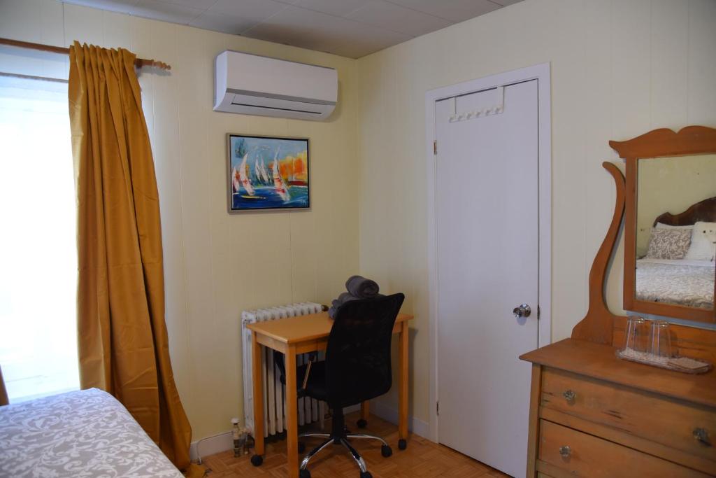 Postel nebo postele na pokoji v ubytování Auberge de la Visitation