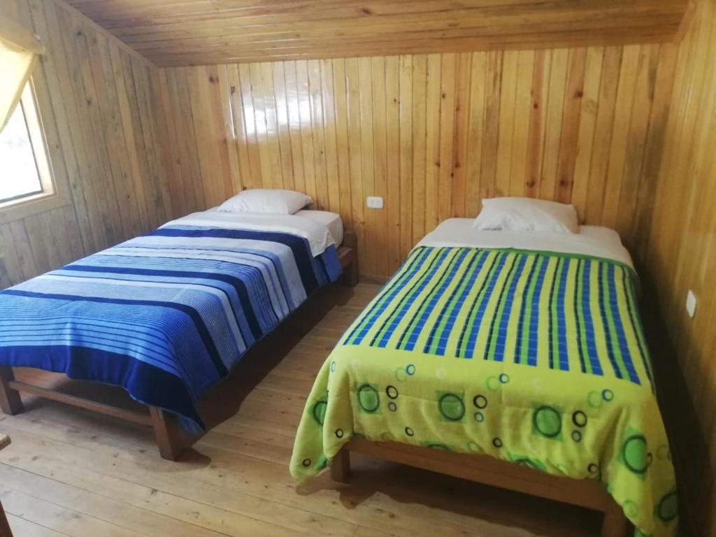 Postel nebo postele na pokoji v ubytování HOSPEDAJE CAMPOS ELÌSEOS