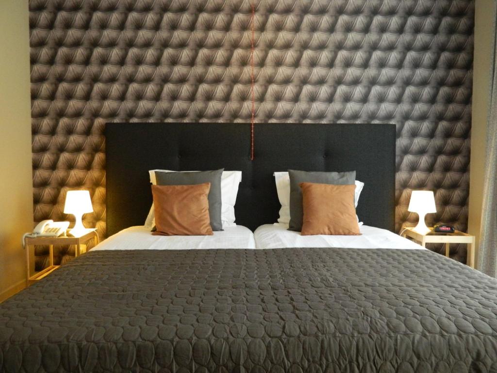 Postel nebo postele na pokoji v ubytování Boutique Hotel Butler