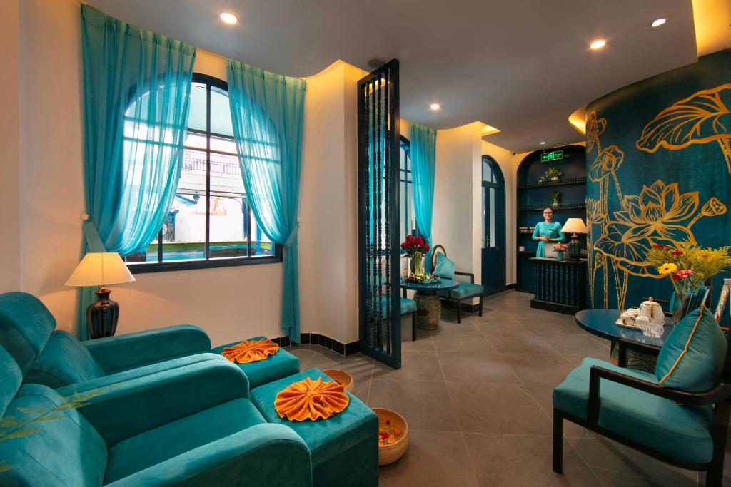 Khu vực ghế ngồi tại Silk River Hoi An Hotel &amp; Spa