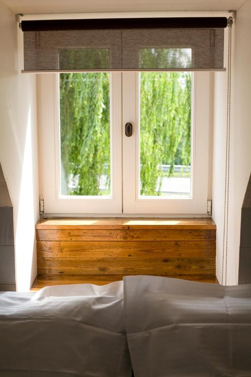Postel nebo postele na pokoji v ubytování B&B Oeren-Plage