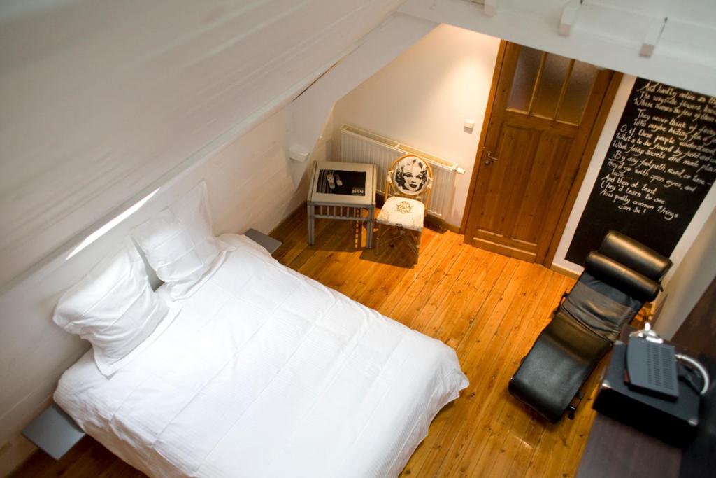 Postel nebo postele na pokoji v ubytování B&B Oeren-Plage