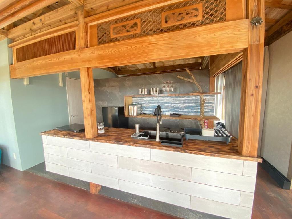 Tamari House, a mansion with coral islands and natural pools, Amami ...