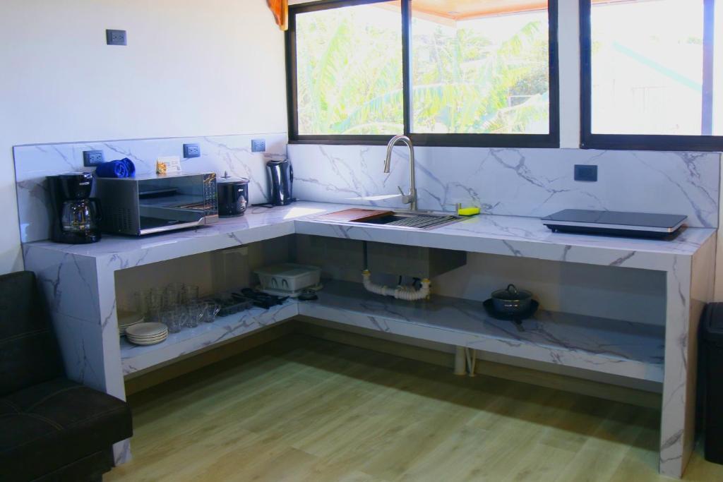 Η κουζίνα ή μικρή κουζίνα στο Casa Hoja Monteverde 2