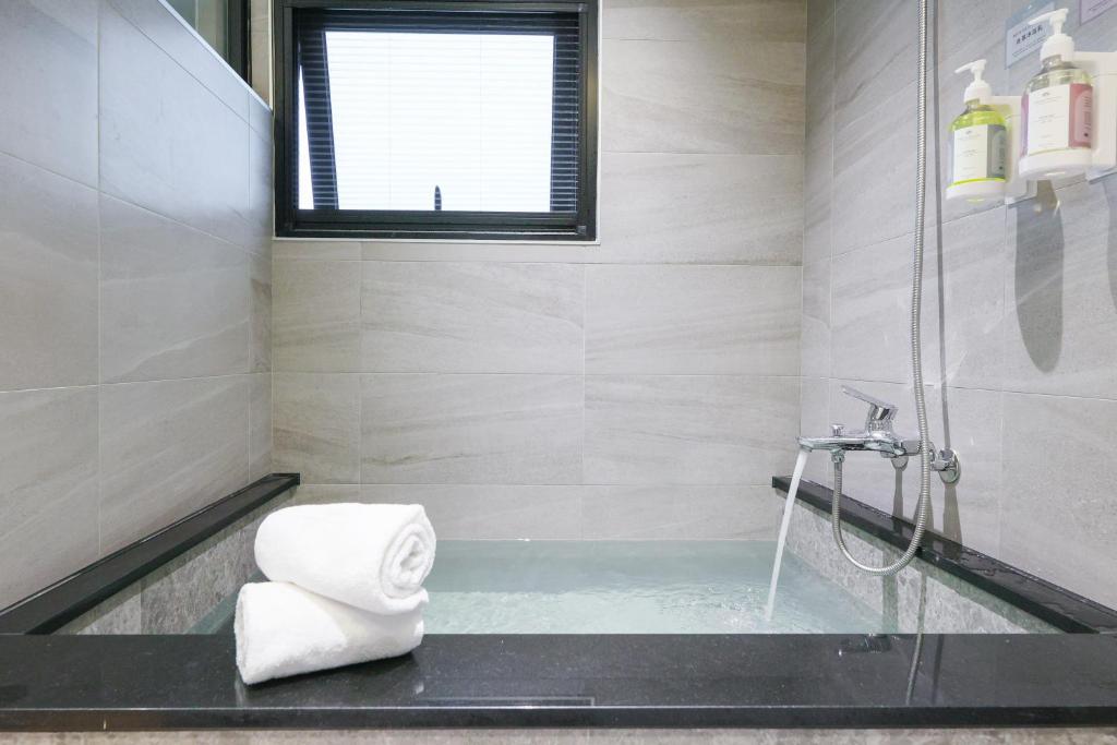 Koupelna v ubytování Green Hot Spring Hotel