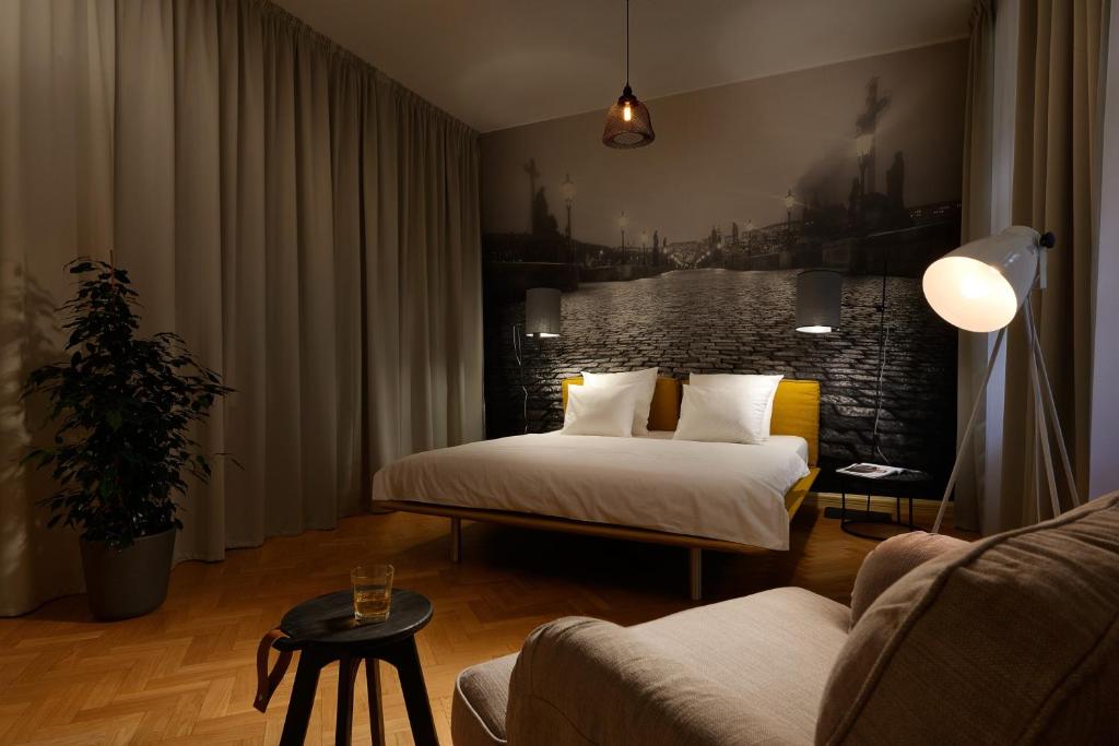 Кровать или кровати в номере U Kapra Apartments