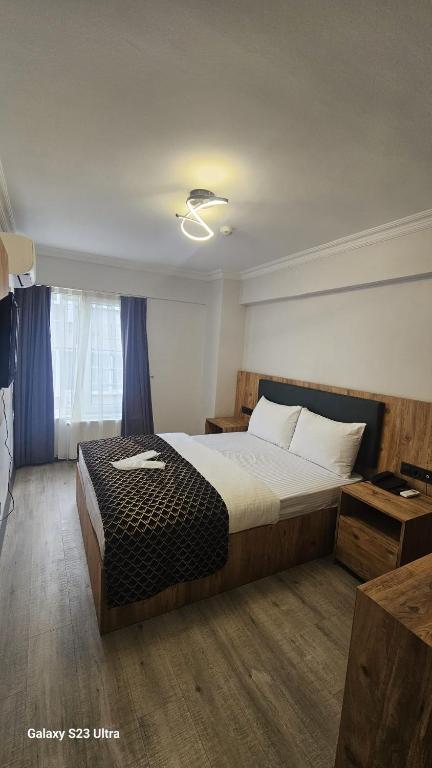 Postel nebo postele na pokoji v ubytování old hatay hotel