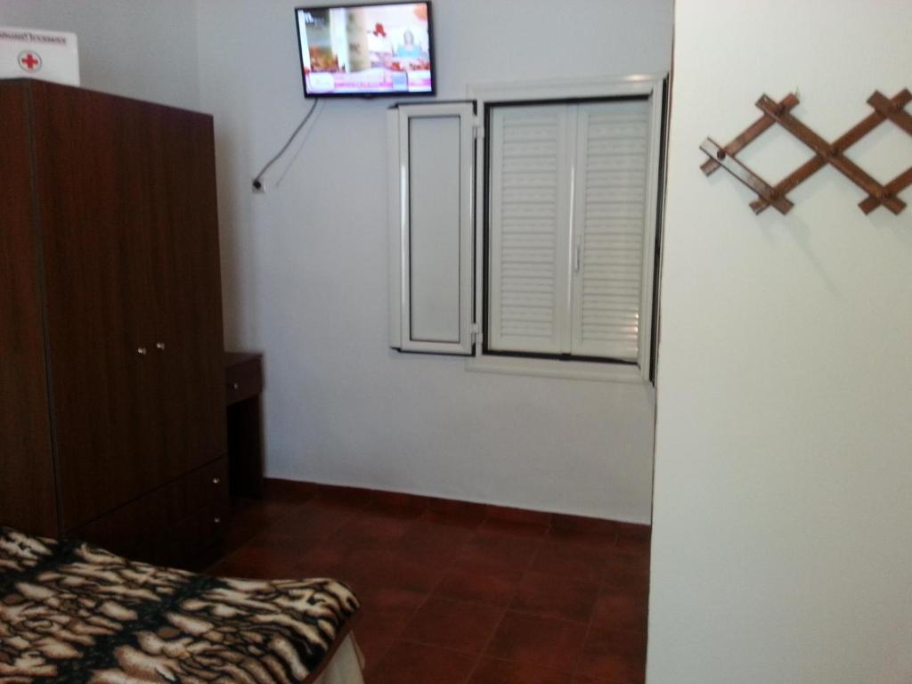Televízia a/alebo spoločenská miestnosť v ubytovaní Vintage House-Vori-Rent Rooms