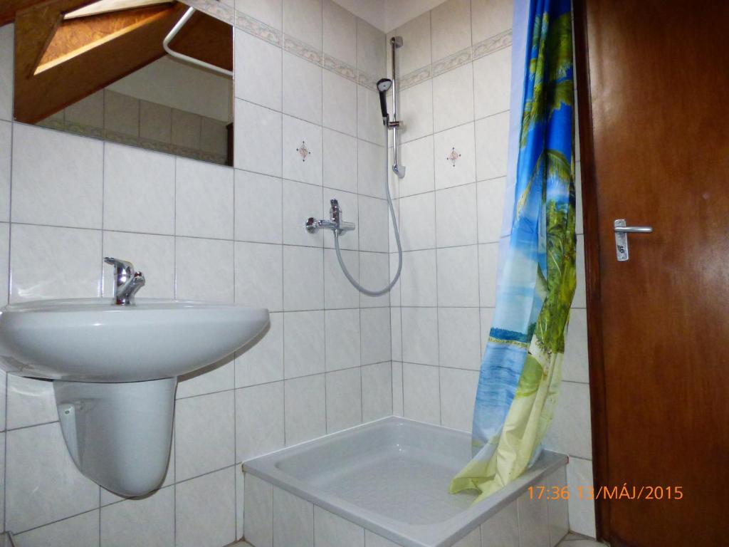 Kúpeľňa v ubytovaní Fábián Apartman-ház