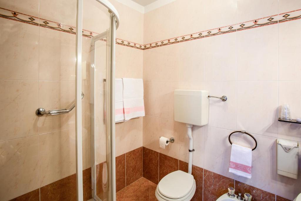 Koupelna v ubytování Hotel Romagna
