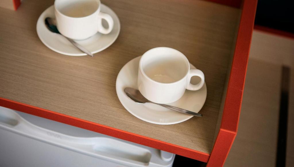 Příslušenství pro přípravu čaje a kávy v ubytování Greenacre Hotel