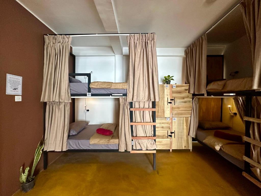 Postel nebo postele na pokoji v ubytování Beyond Nomad Luxury Hostel