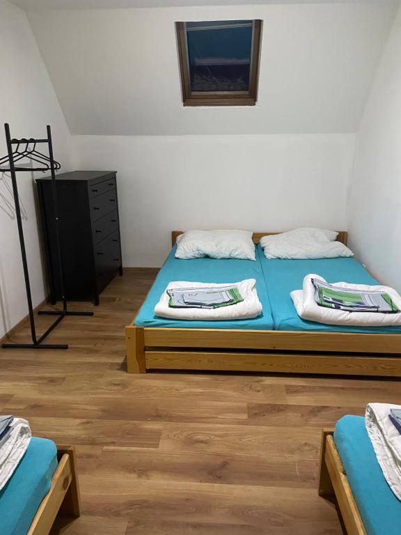 Postel nebo postele na pokoji v ubytování Chalupa Denis & Marek