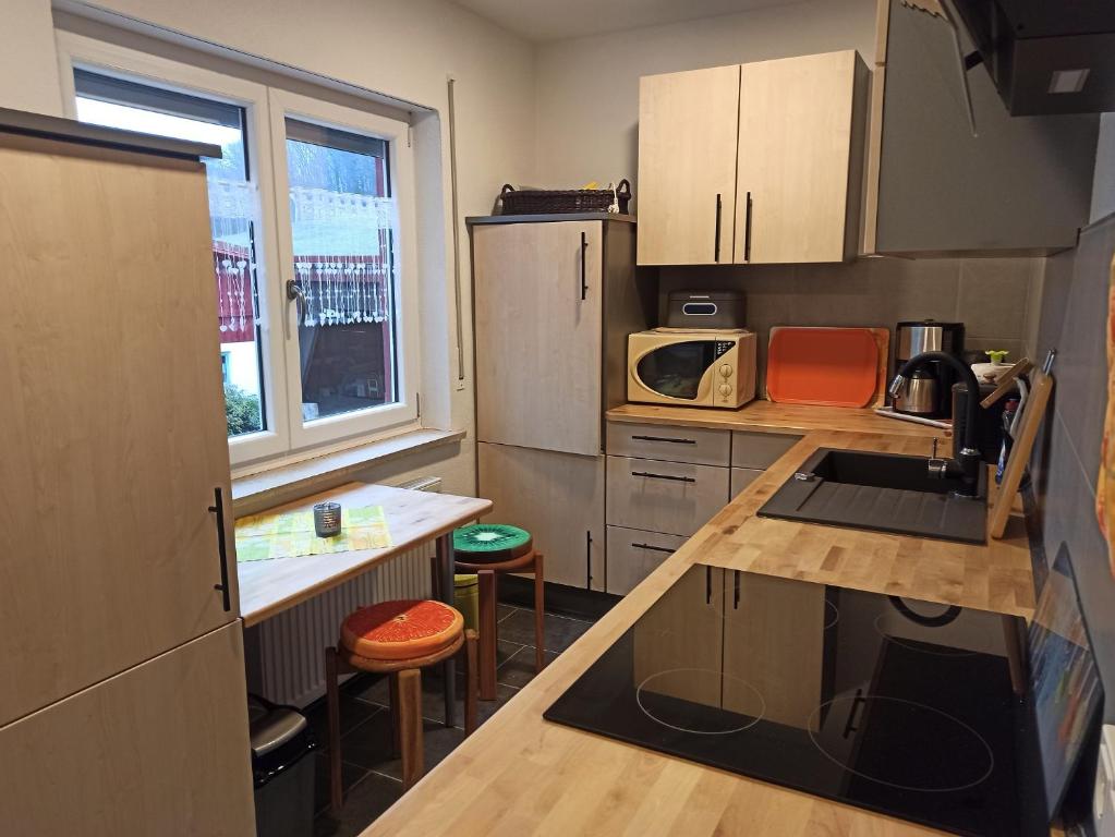 Kuchyň nebo kuchyňský kout v ubytování Reitstation Roßmühle