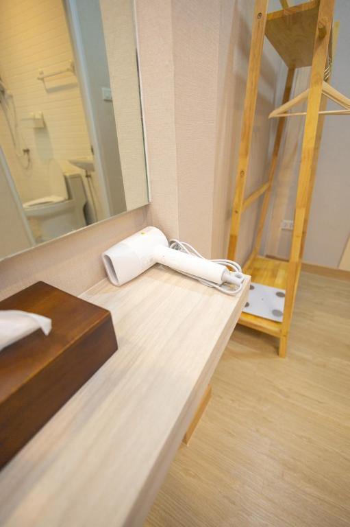 Koupelna v ubytování Baancoconutkohlarn