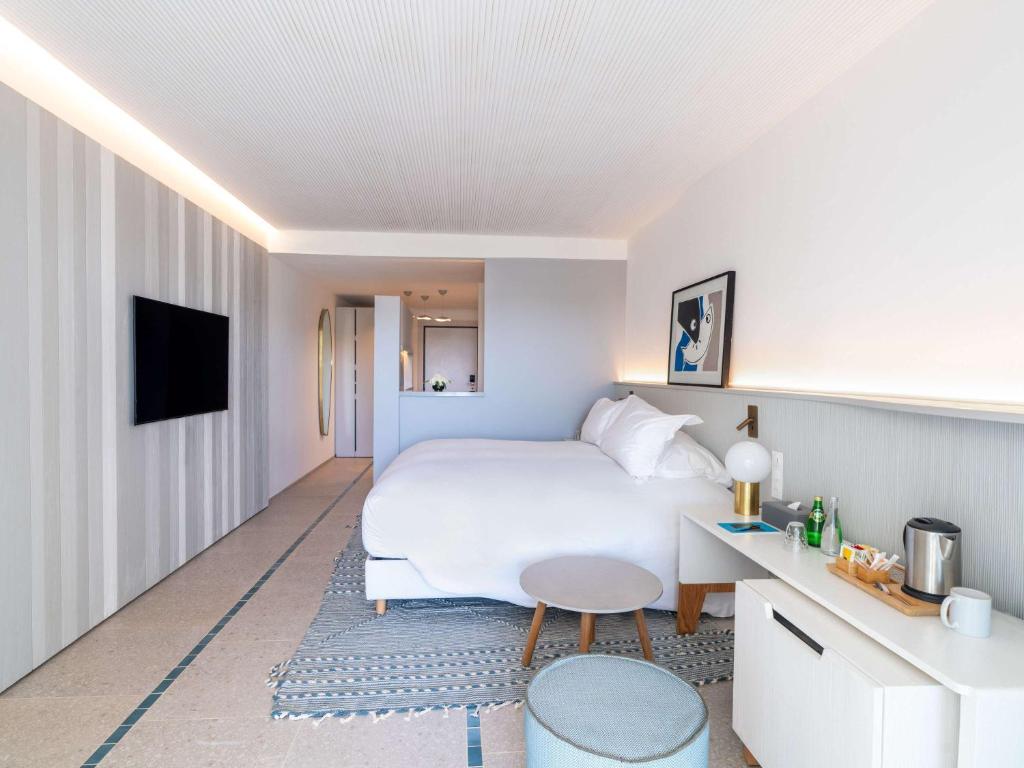 TV a/nebo společenská místnost v ubytování Sofitel Agadir Thalassa Sea & Spa