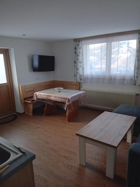 TV a/nebo společenská místnost v ubytování Ferienhaus Hochwimmer