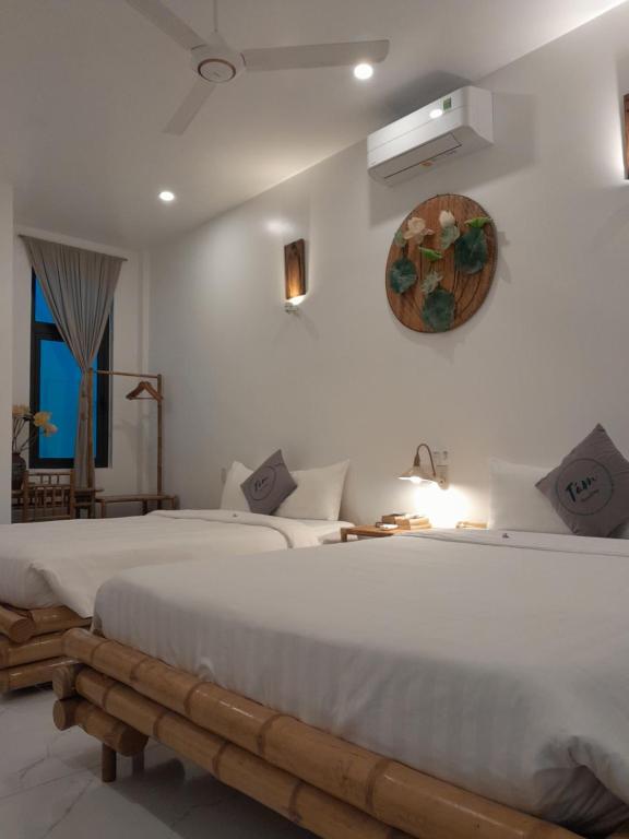 Postel nebo postele na pokoji v ubytování Tâm Homestay