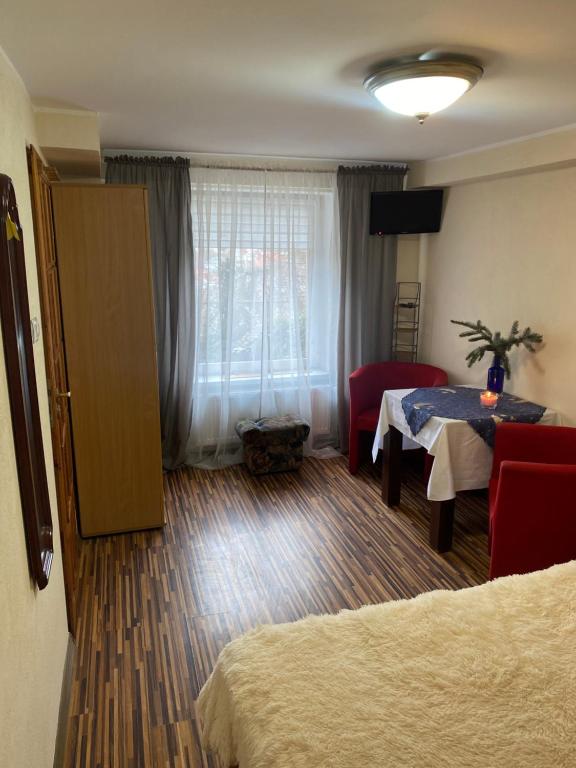 Postel nebo postele na pokoji v ubytování U Wojciecha