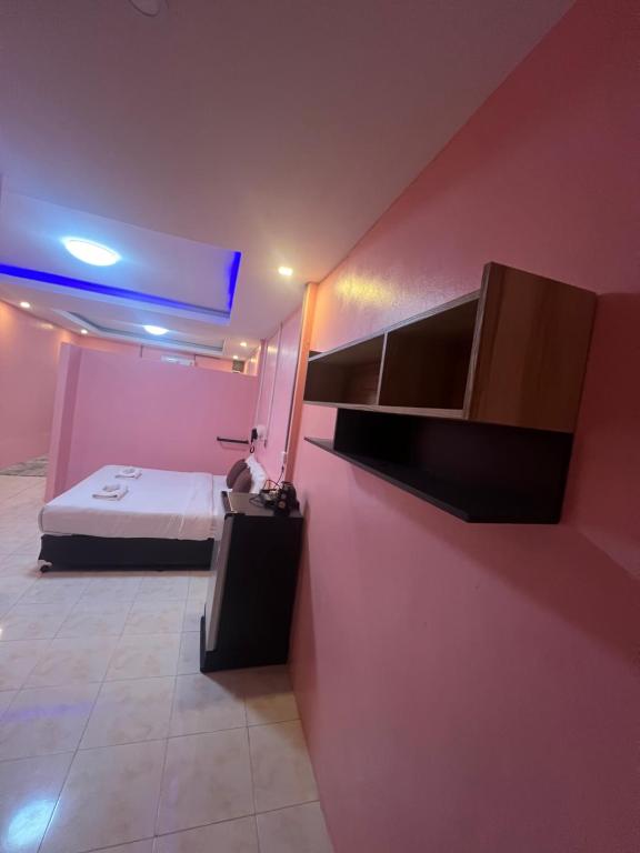 Postel nebo postele na pokoji v ubytování คลิ๊กรีสอร์ท (Click Resort)