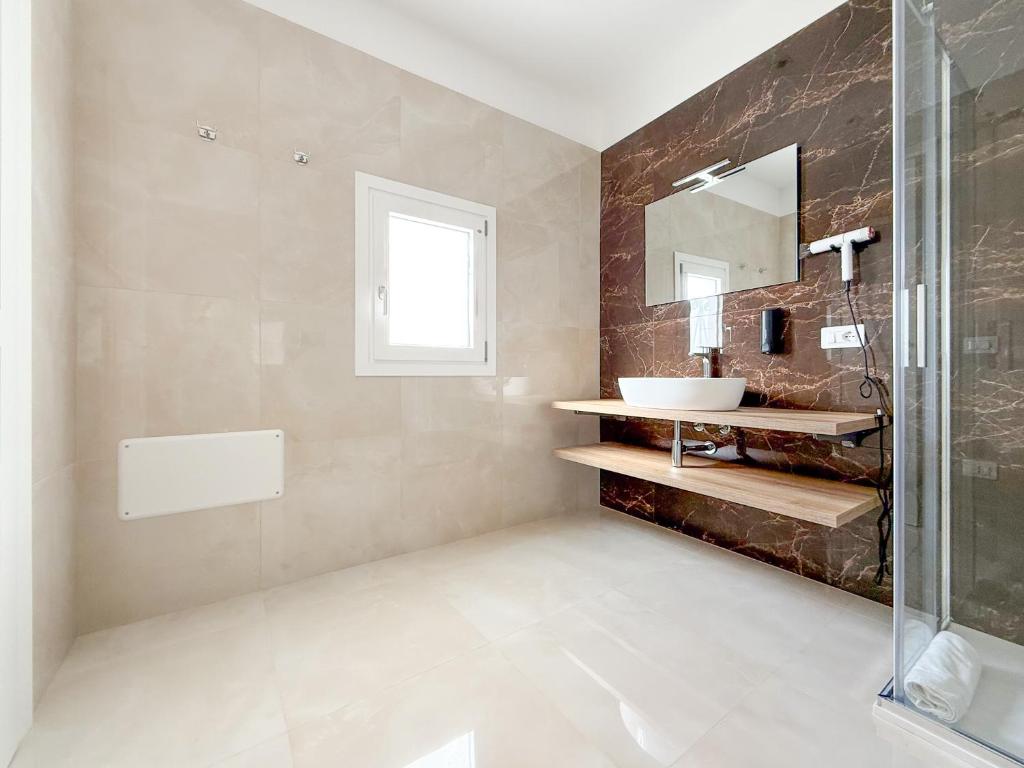 Koupelna v ubytování FeVi Rooms