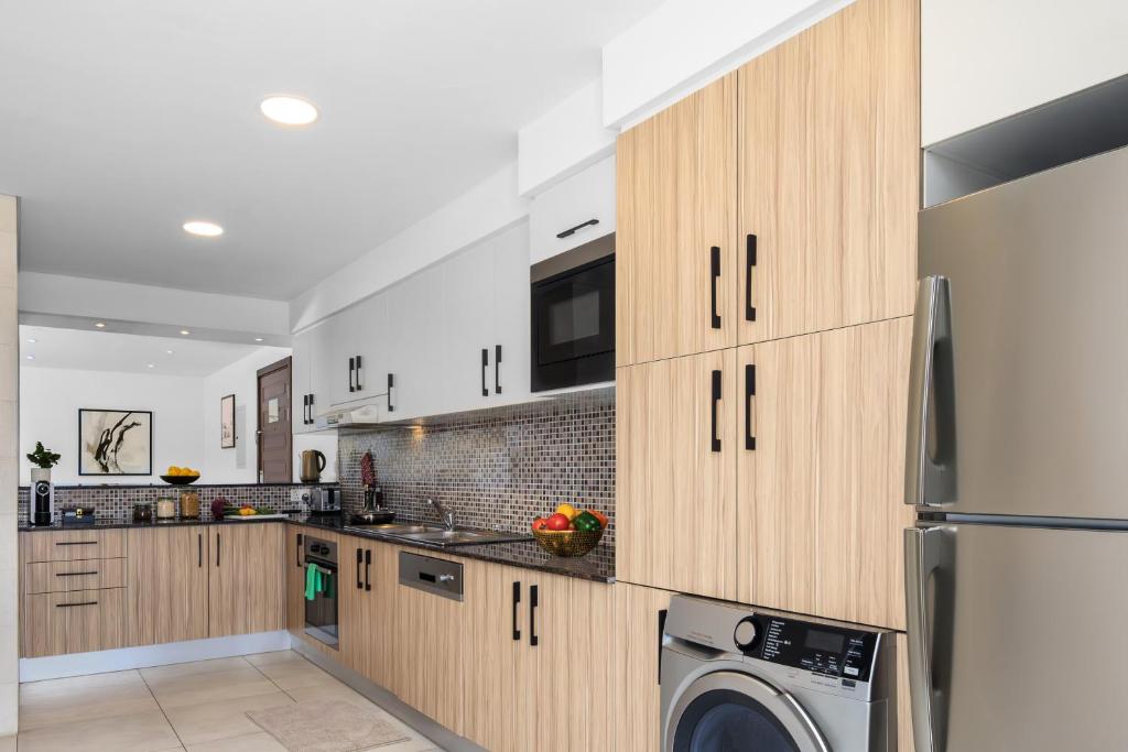 Dapur atau dapur kecil di Somerset West Bay Doha