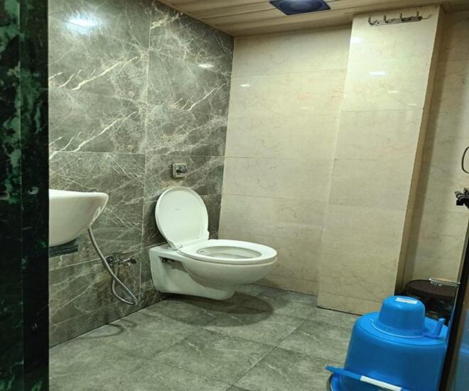Koupelna v ubytování Fathima Dormitory Andheri East Subway
