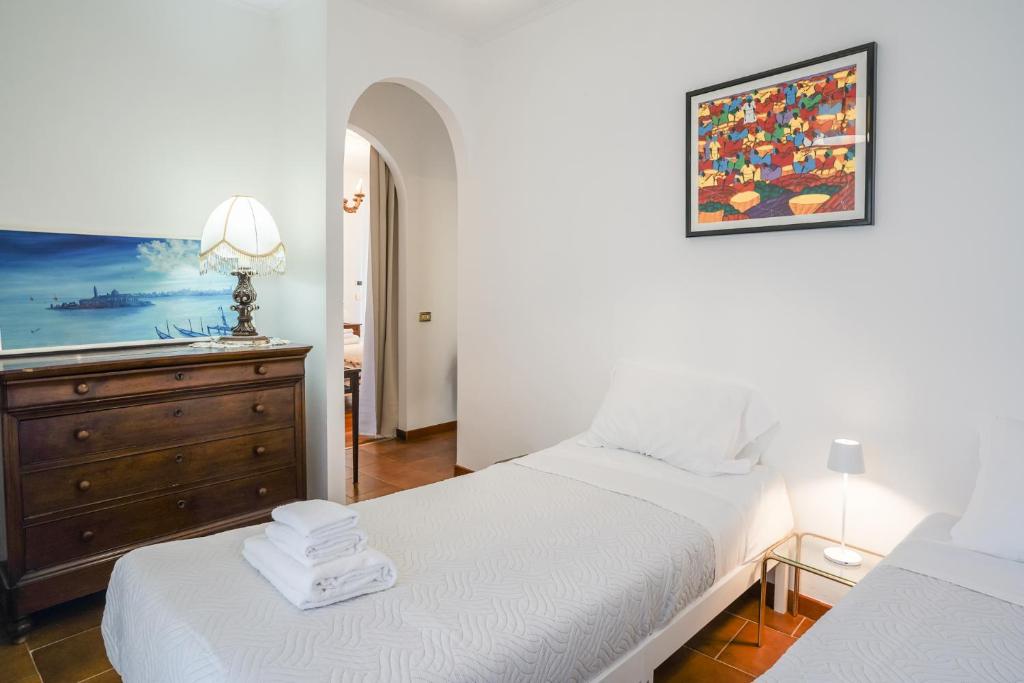 Postel nebo postele na pokoji v ubytování La Villa di Rudy