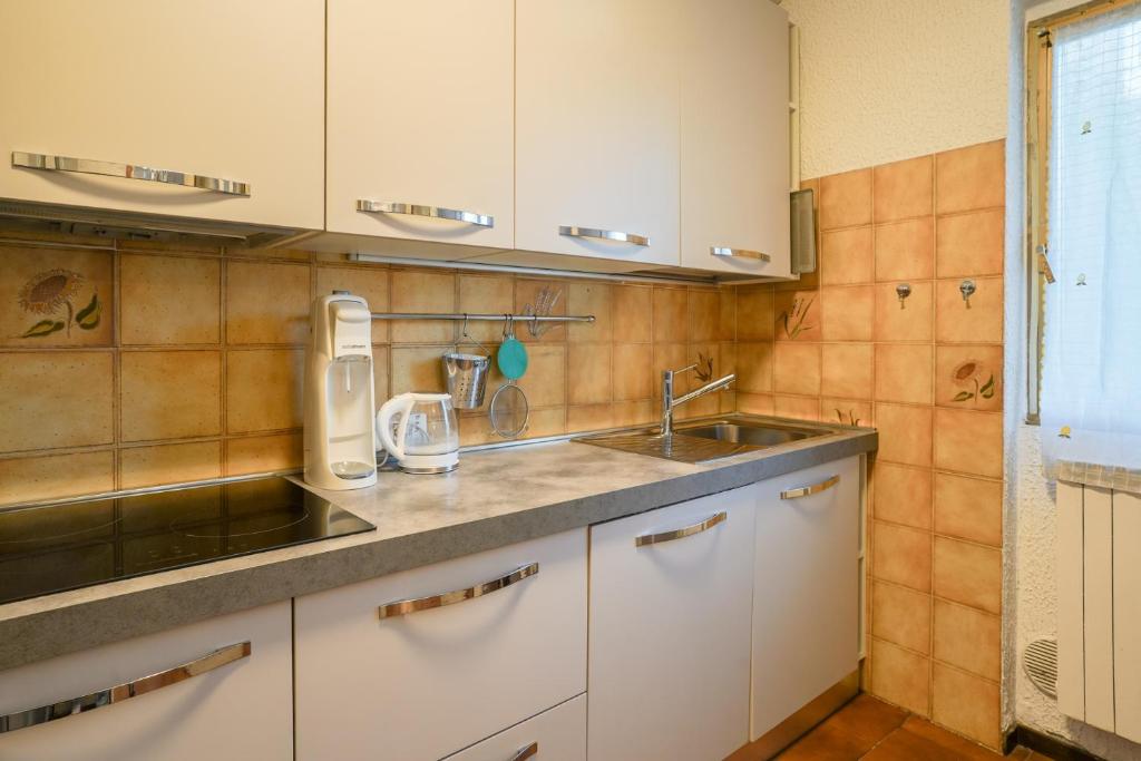 Kuchyň nebo kuchyňský kout v ubytování La Villa di Rudy