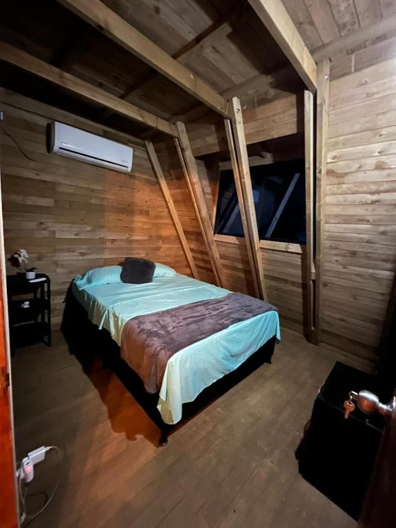 Postel nebo postele na pokoji v ubytování Glamping Verde Melcocho
