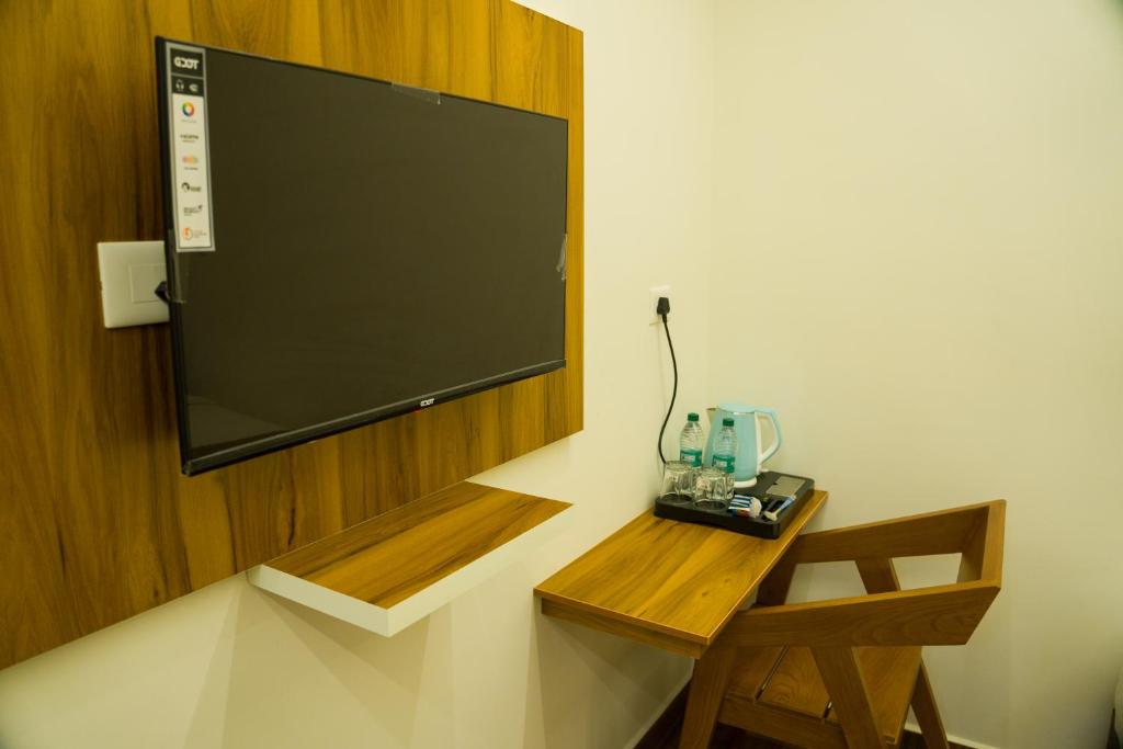 TV a/nebo společenská místnost v ubytování FLY VIEW Airport Residency