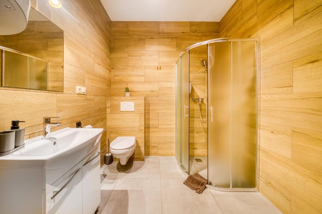 Koupelna v ubytování HM Apartments