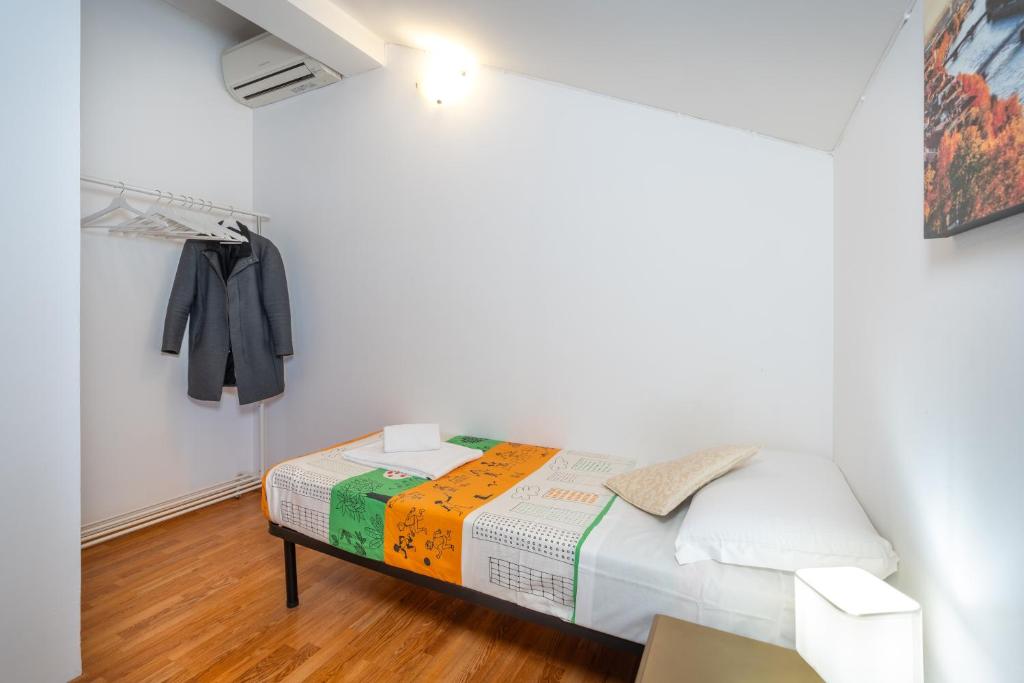 Postel nebo postele na pokoji v ubytování Cittadella Suite