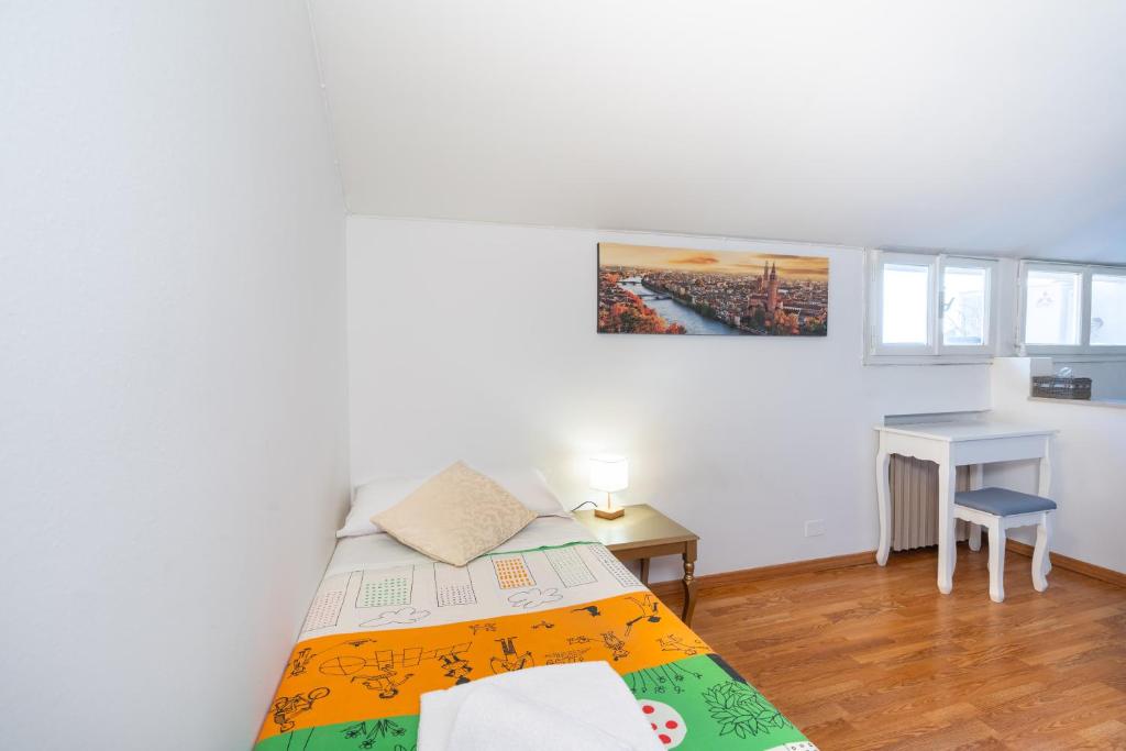Postel nebo postele na pokoji v ubytování Cittadella Suite