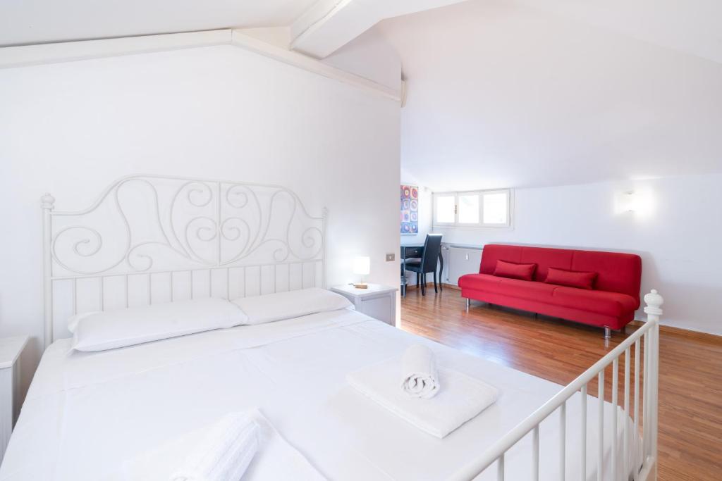 Postel nebo postele na pokoji v ubytování Cittadella Suite